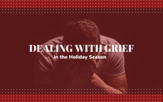 a man holding his face in his hands labeled dealing with grief in the holiday season